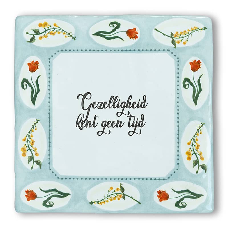 Tegeltje met bloemen en tekst, midden in blauw kader