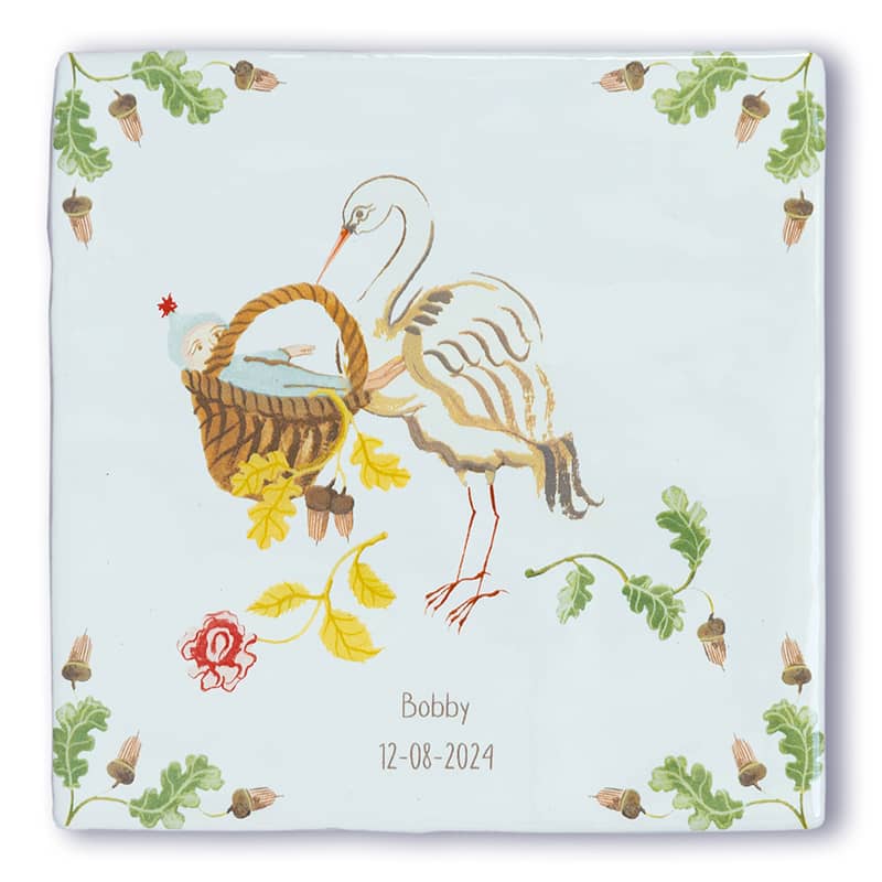 Geboortetegeltje ooievaar met baby in mand, decoratieve bladeren