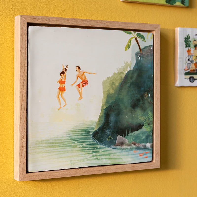Geslaagd cadeau tegeltje twee mensen springen van klif kleurrijke muur