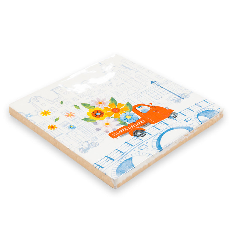Delfts blauw tegeltje met bloemen en auto