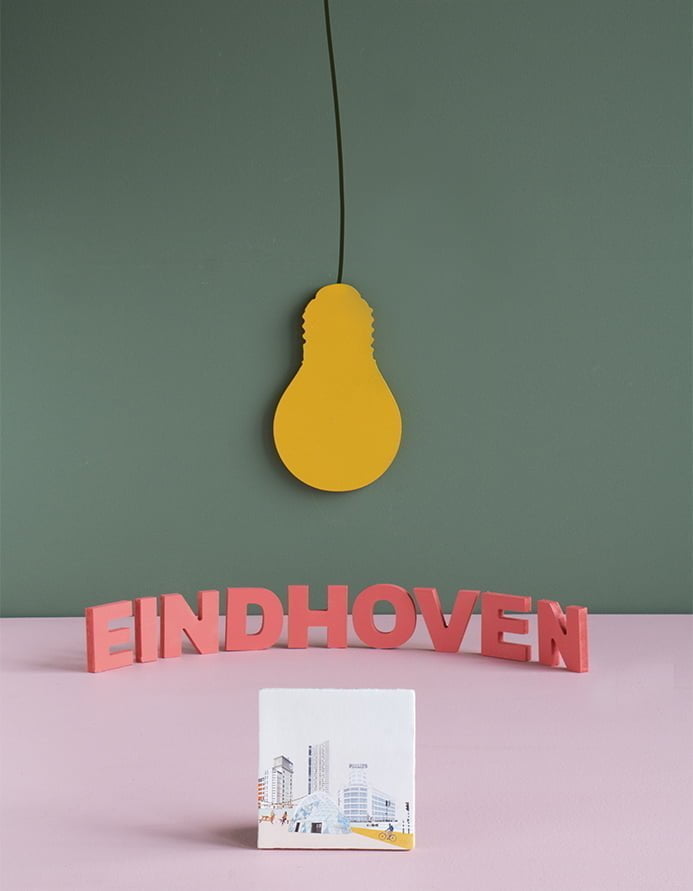 Tegeltje Eindhoven met stadsafbeelding op roze ondergrond