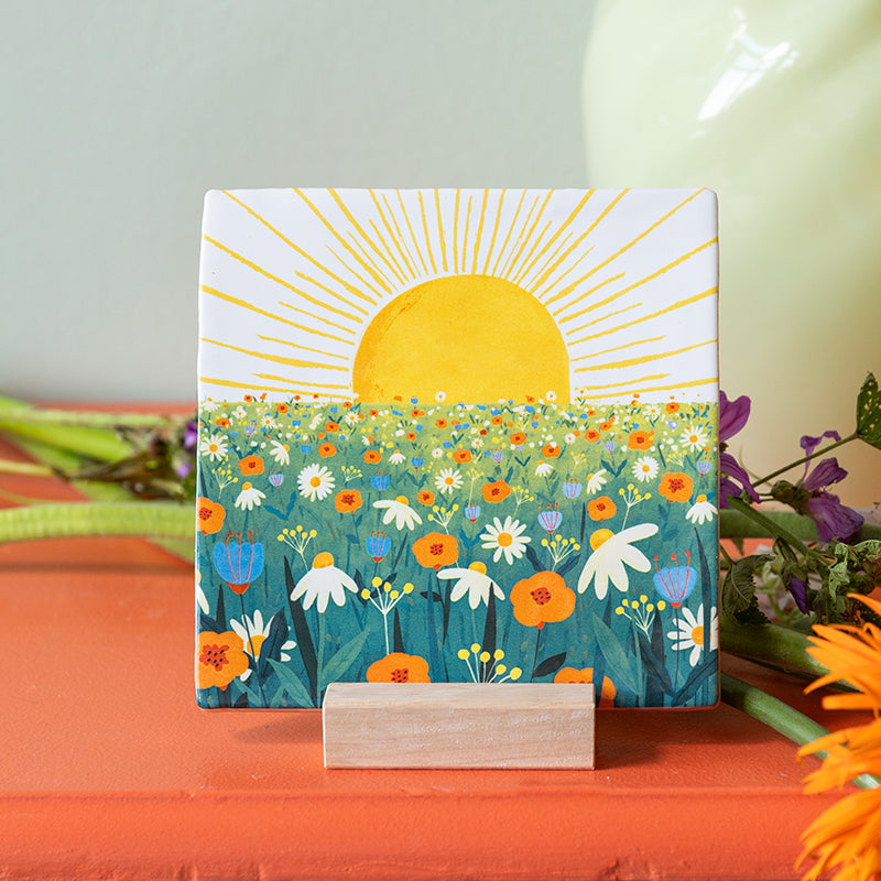 Tegeltje met zon en bloemen