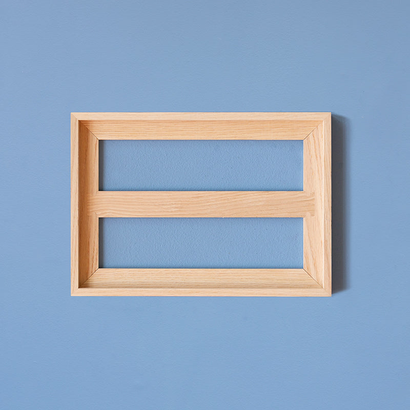 Eikenhouten frame voor meerdere tegels van StoryTiles. Beschikbaar voor 6 en 9 tegels