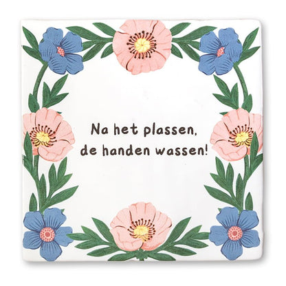 Tegeltje met bloemen en tekst over handen wassen