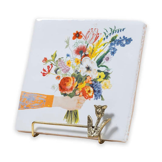 Gouden tegelhouder in standaard met een bloemenafbeelding