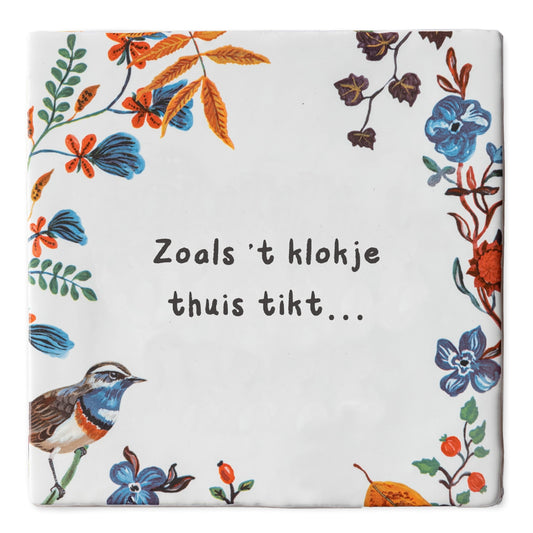Tegeltje met flora en tekst over thuisgevoel