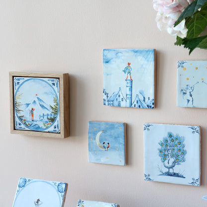 Tegeltjes met verschillende blauwe illustraties