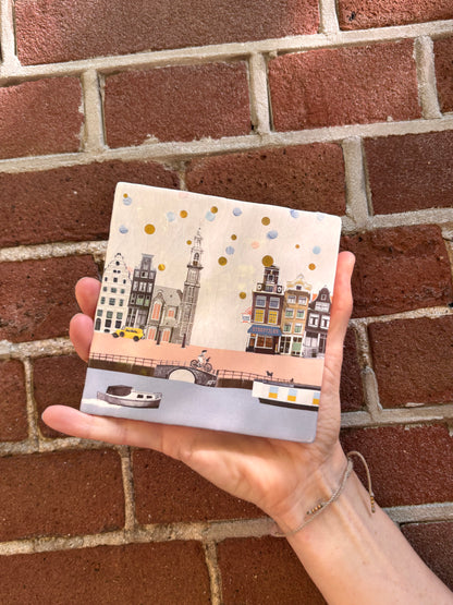 Tegeltje feest in amsterdam met confetti