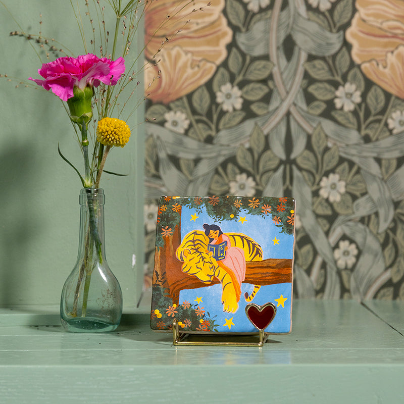 Tegeltje voorlezen bij een leeuw 