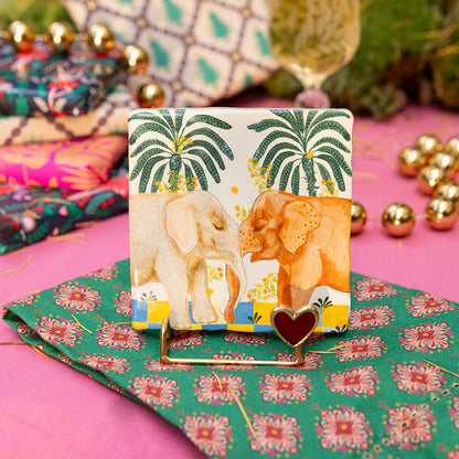 Tegeltje met twee olifanten en palmbomen op houder