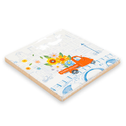 Delfts blauw tegeltje met bloemen en auto