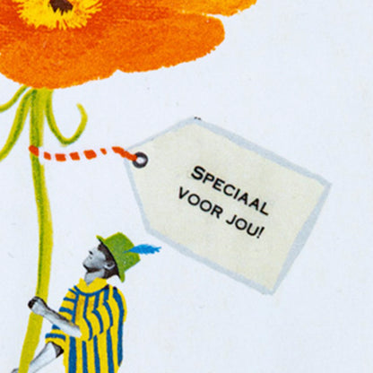 Close up van kaartje aan de rode bloem met persoonlijke tekst