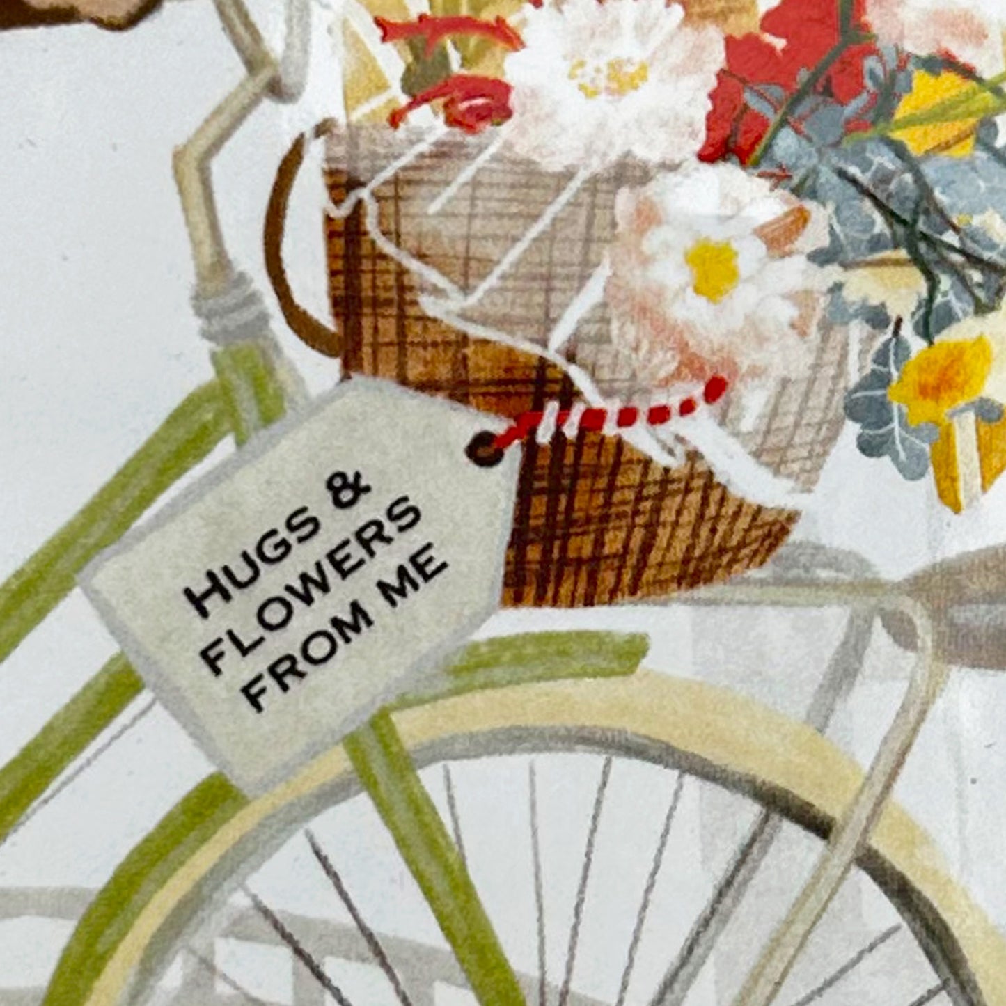 Inzoom op personalisatie tegeltje Vrolijkheid in een fietsmand